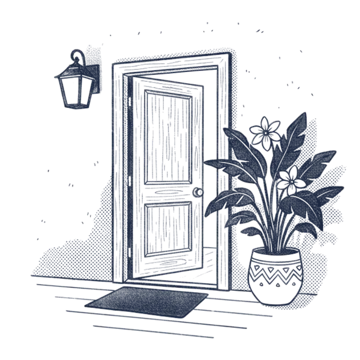 A porch light on beside a front door left open